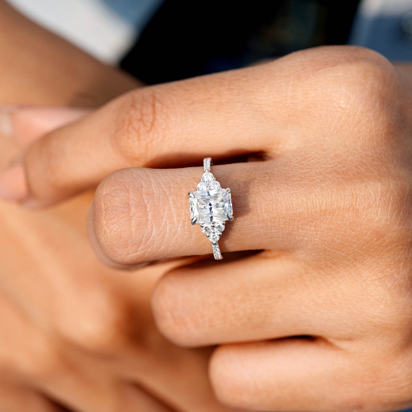 Round, Radiant Cut Colorless Engagement Ring