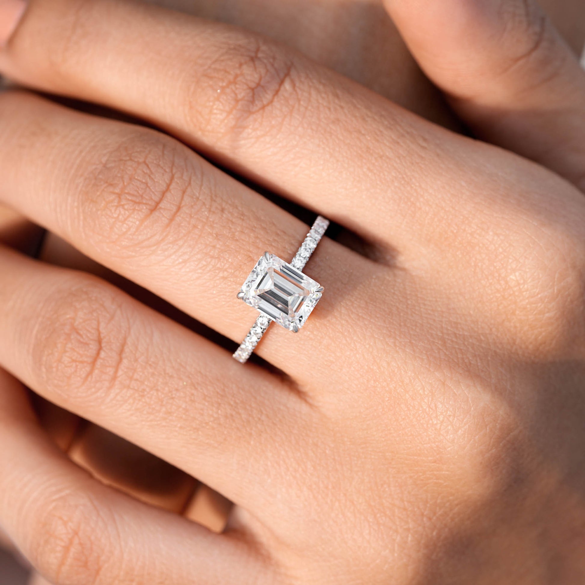 Round, Emerald Cut Colorless Engagement Ring