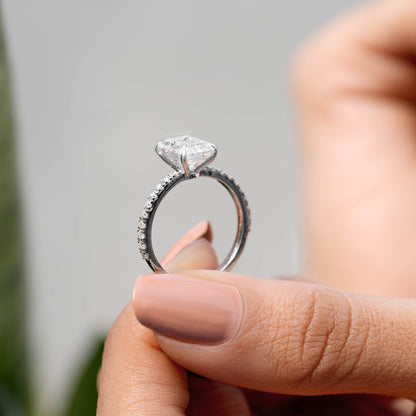 Round, Emerald Cut Colorless Engagement Ring
