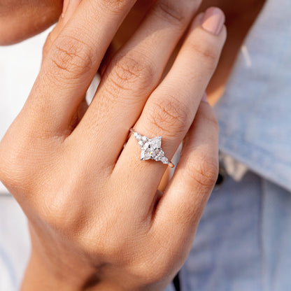 Round, Marquise Cut Colorless Engagement Ring