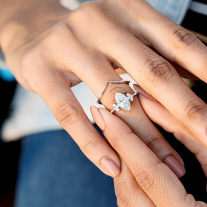 Round, Marquise Cut Colorless Engagement Ring