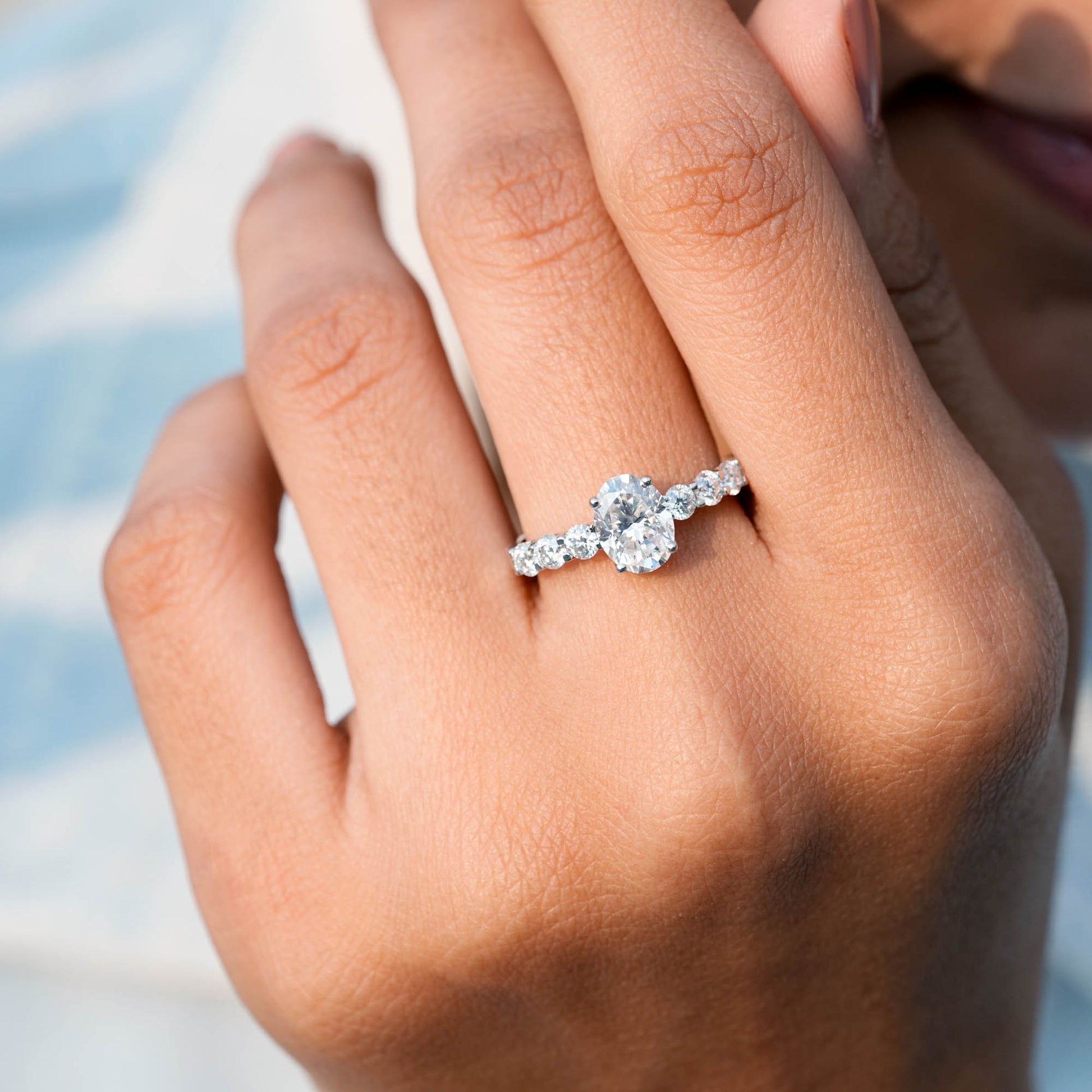 Oval, Round Cut Colorless Engagement Ring