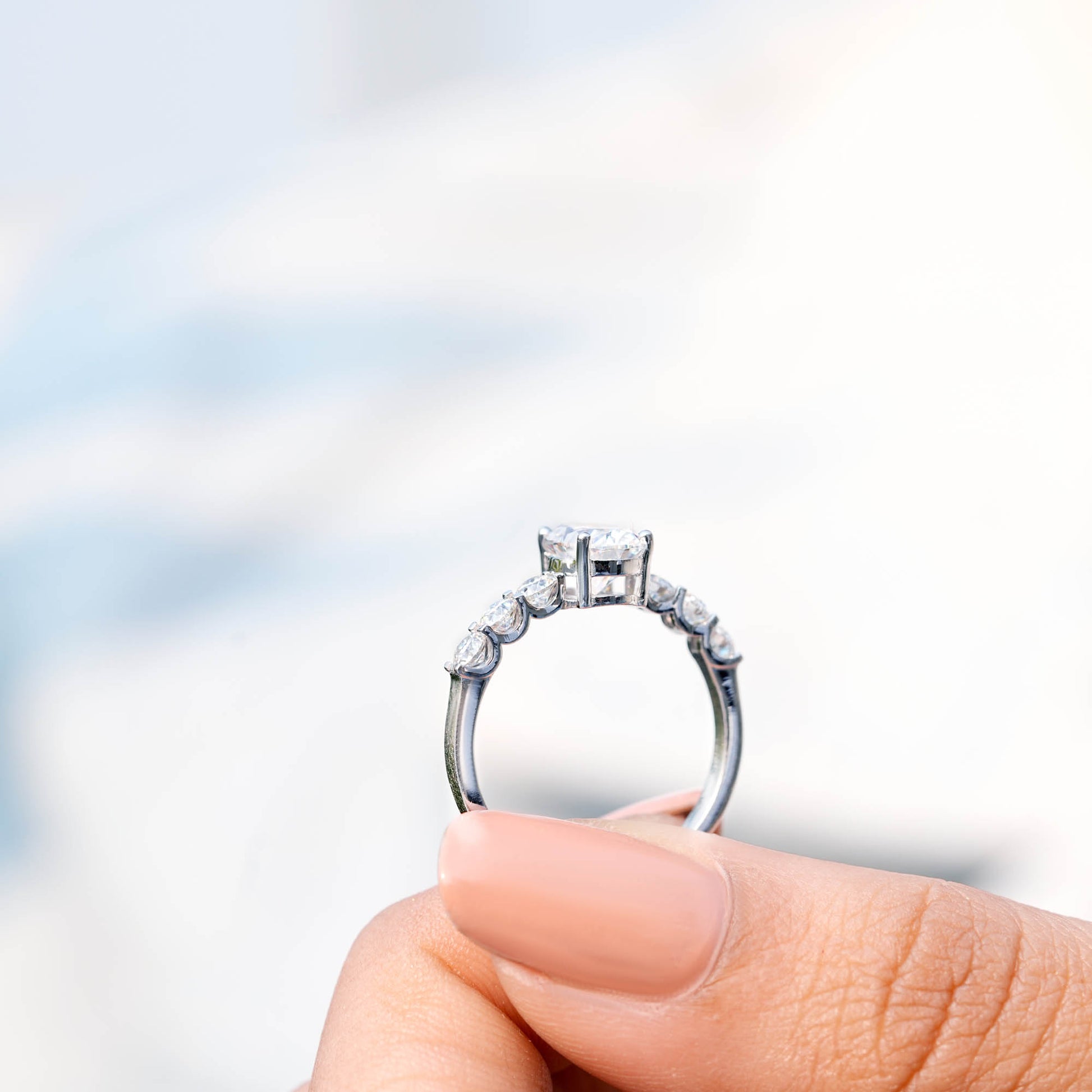 Oval, Round Cut Colorless Engagement Ring