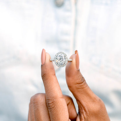 Round, Oval Cut Colorless Engagement Ring