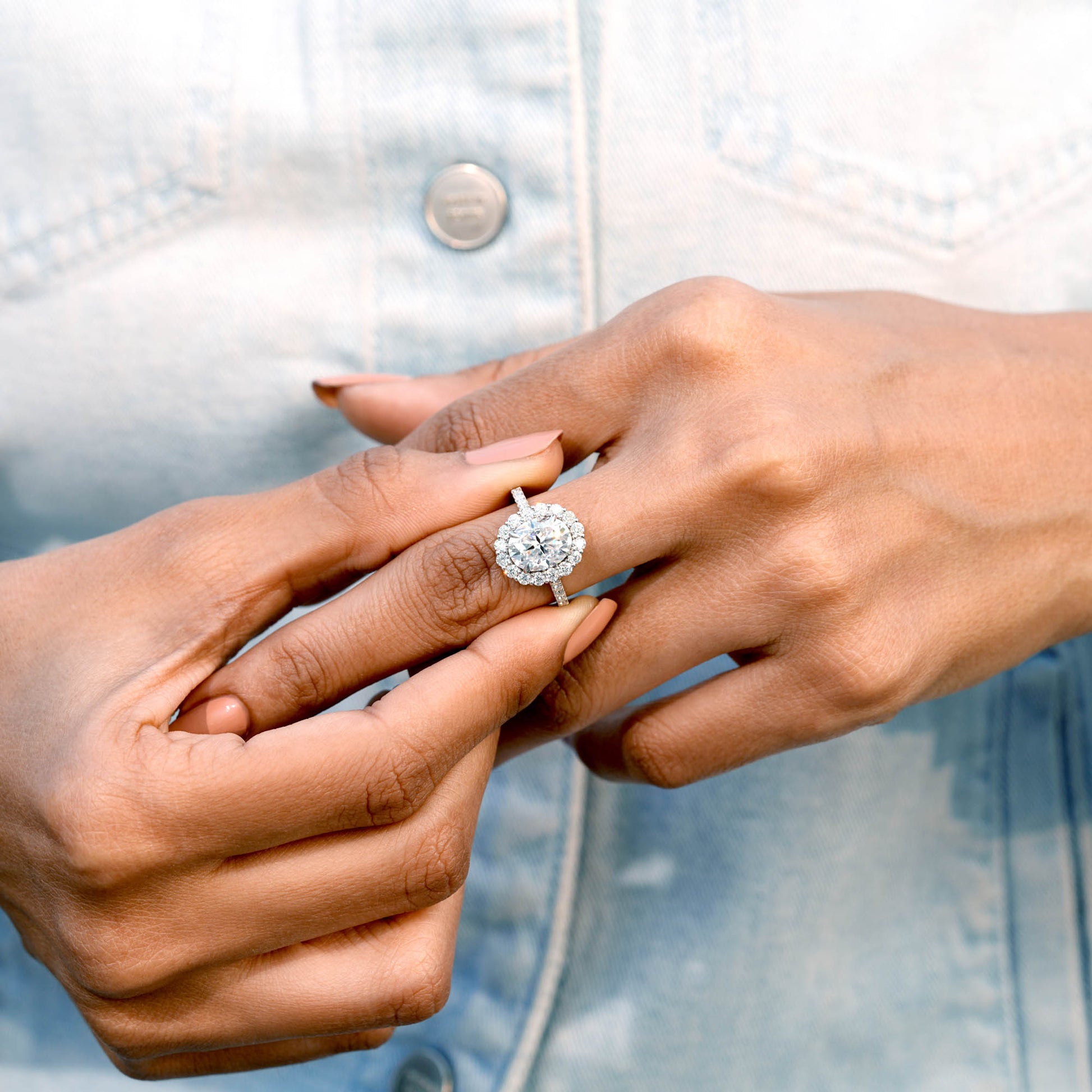 Round, Oval Cut Colorless Engagement Ring