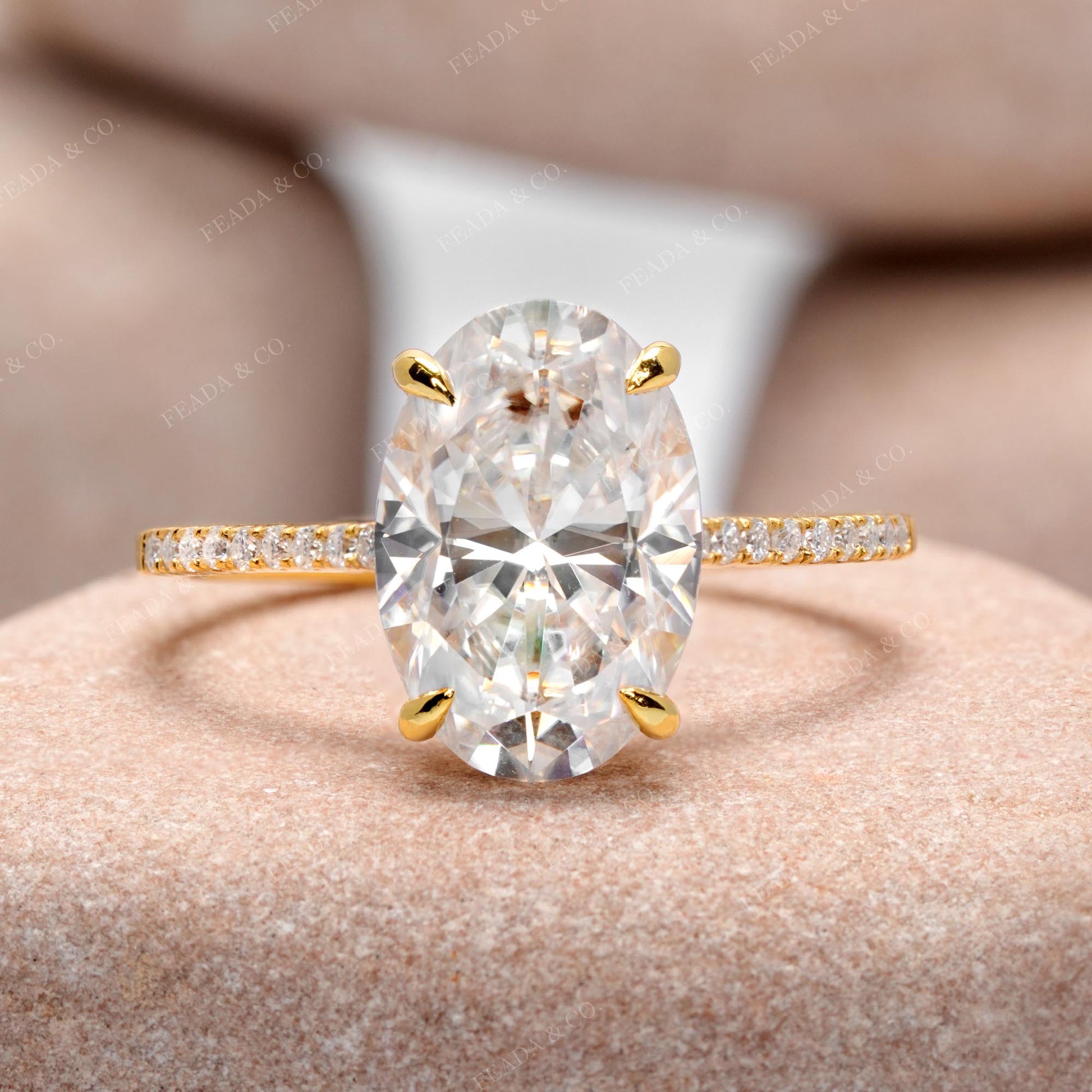 Round, Oval Cut Colorless Engagement Ring