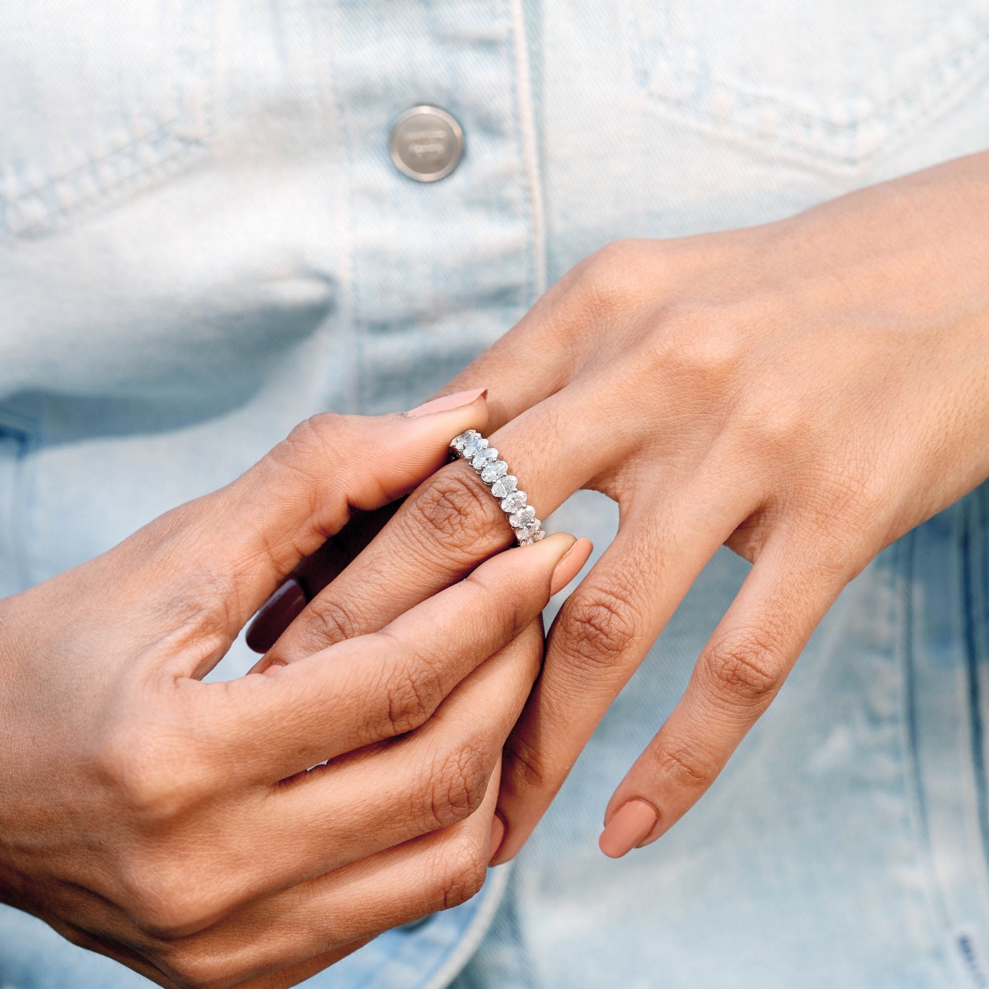 Oval Cut Colorless Engagement Ring