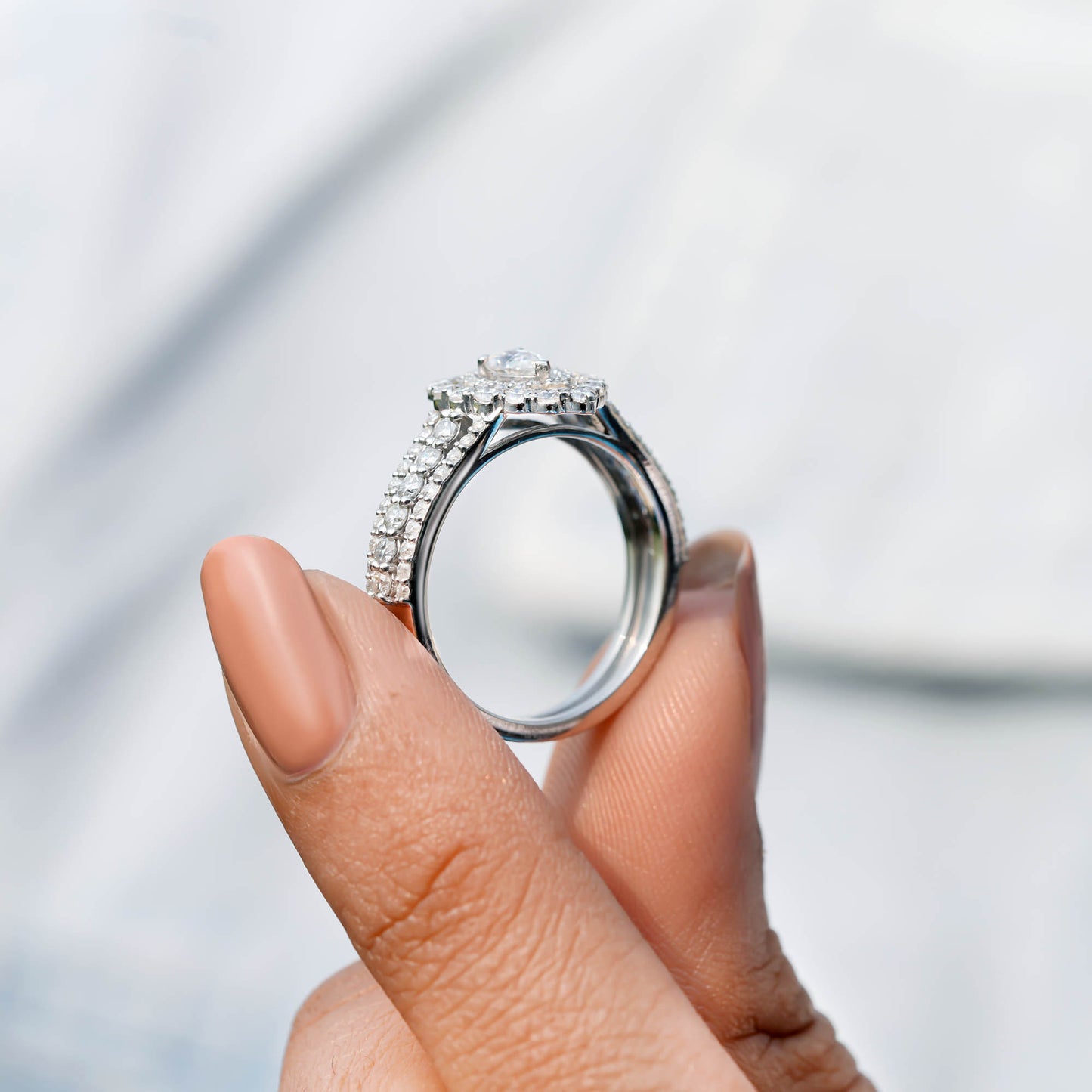 Pear, Round Cut Colorless Engagement Ring