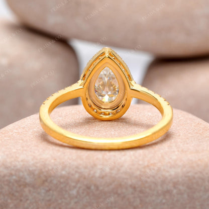 Pear, Round Cut Colorless Engagement Ring