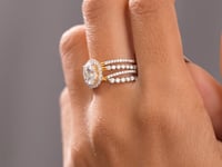 Round, Oval Cut Colorless Engagement Ring