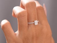Round, Radiant Cut Colorless Engagement Ring