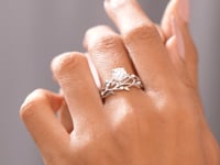 Round Cut Colorless Engagement Ring