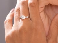 Round Cut Colorless Engagement Ring