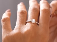 Round Cut Colorless Engagement Ring