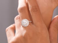 Round Cut Colorless Engagement Ring
