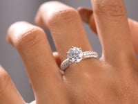 Round Cut Colorless Engagement Ring