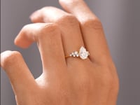 Pear, Round Cut Colorless Engagement Ring