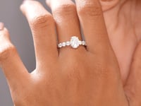 Oval, Round Cut Colorless Engagement Ring