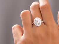 Round, Oval Cut Colorless Engagement Ring
