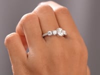 Round, Oval Cut Colorless Engagement Ring