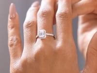 Round, Emerald Cut Colorless Engagement Ring