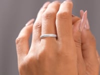 Round Cut Colorless Engagement Ring