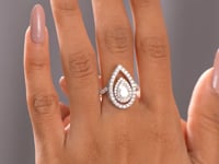 Pear, Round Cut Colorless Engagement Ring