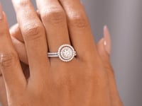 Round Cut Colorless Engagement Ring