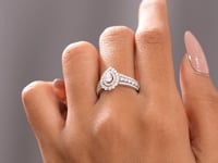 Pear, Round Cut Colorless Engagement Ring