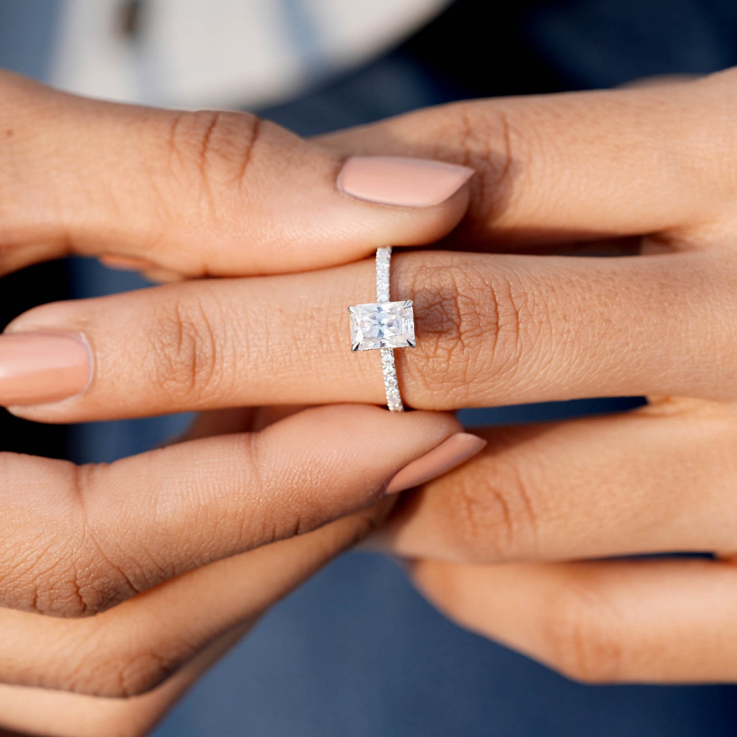 Round, Radiant Cut Colorless Engagement Ring