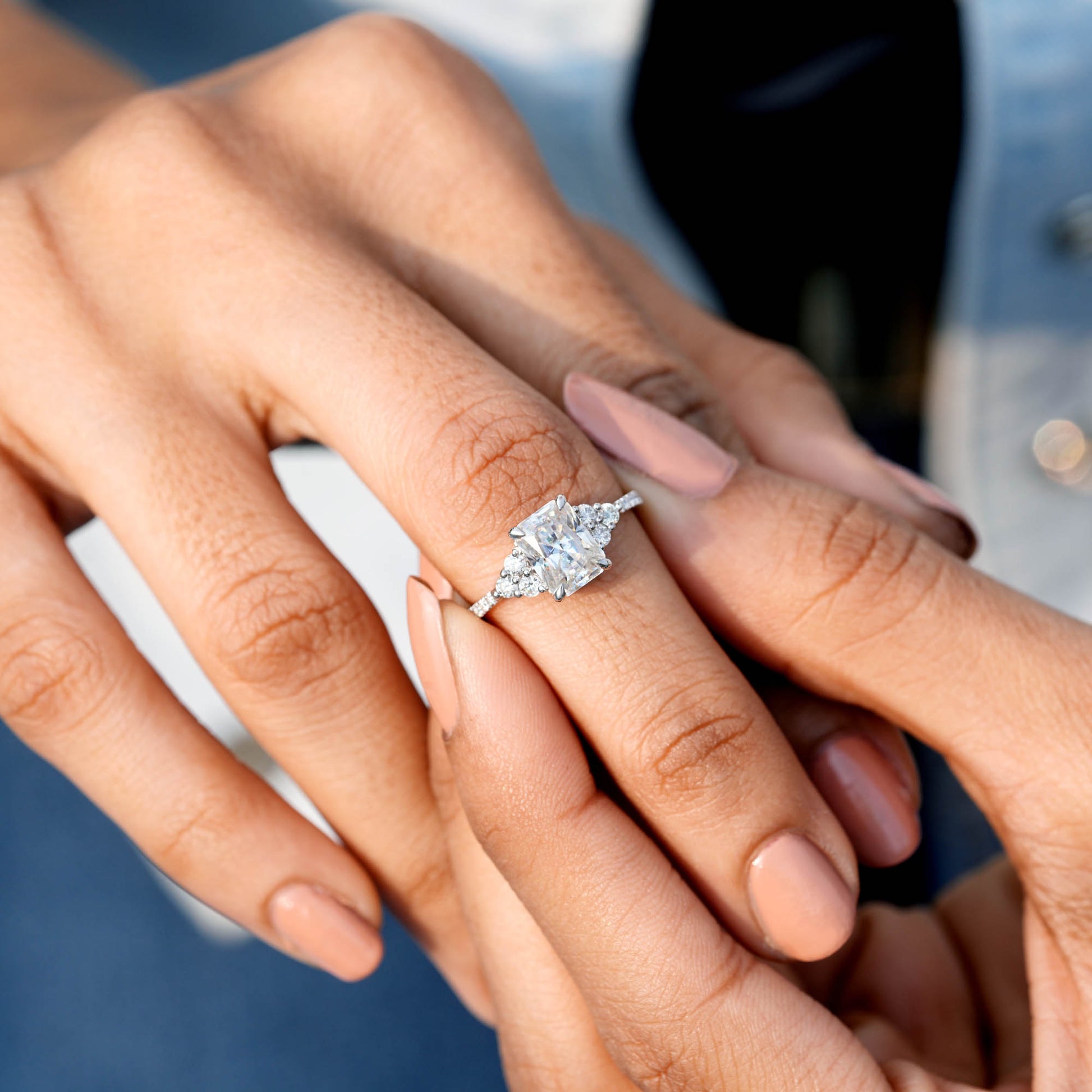 Round, Radiant Cut Colorless Engagement Ring