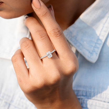 Round, Radiant Cut Colorless Engagement Ring