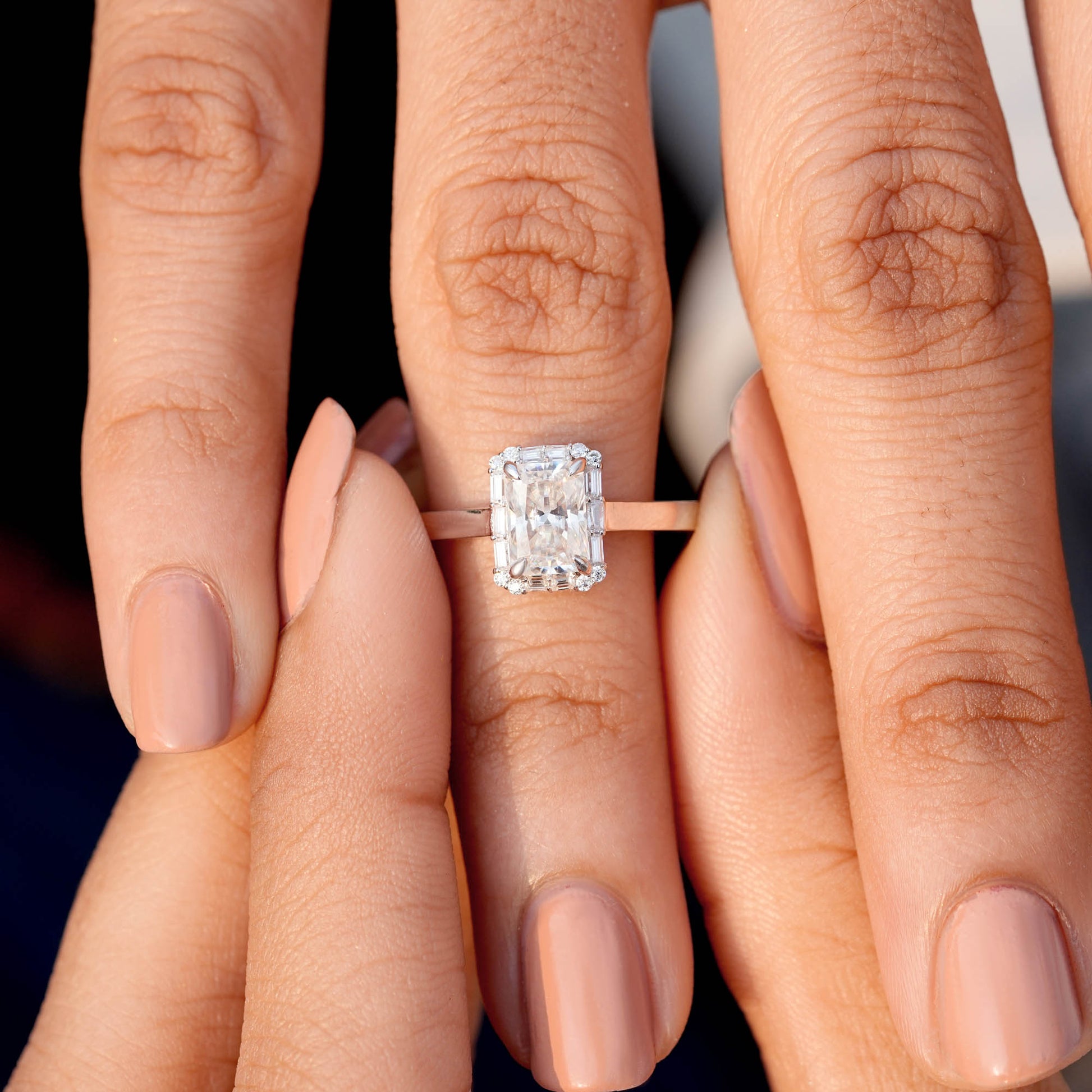 Round, Radiant, Baguette Cut Colorless Engagement Ring