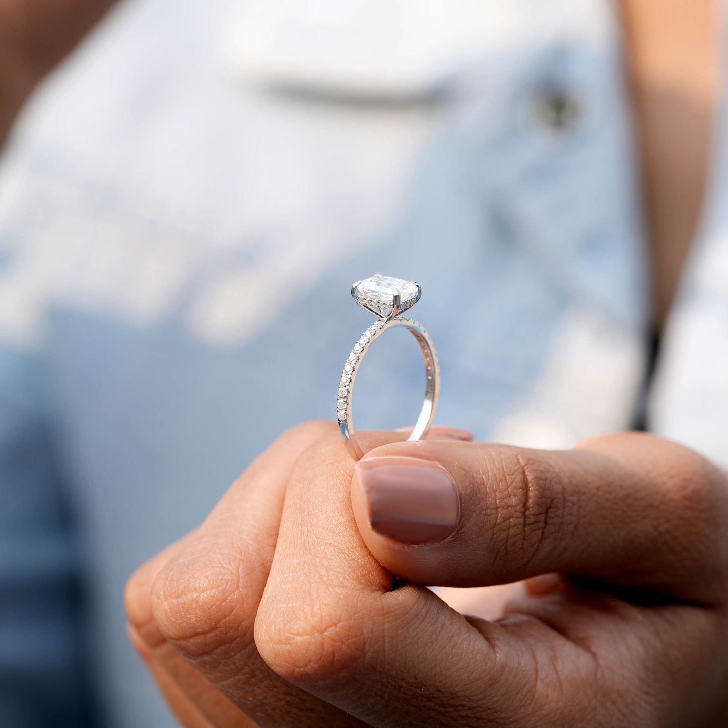 Round, Radiant Cut Colorless Engagement Ring