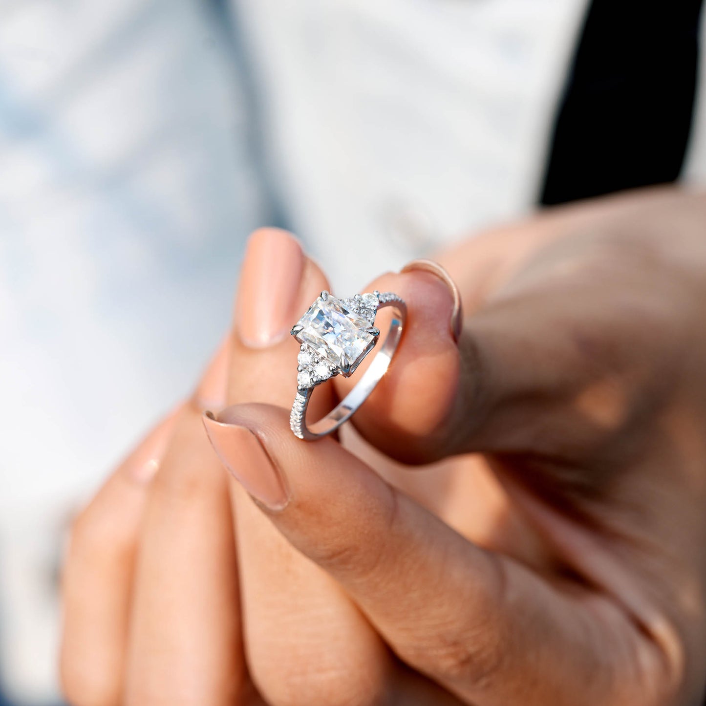 Round, Radiant Cut Colorless Engagement Ring