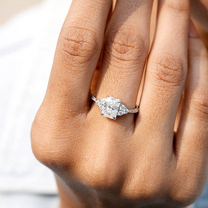 Round, Radiant Cut Colorless Engagement Ring
