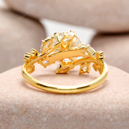 Round, Marquise Cut Colorless Engagement Ring