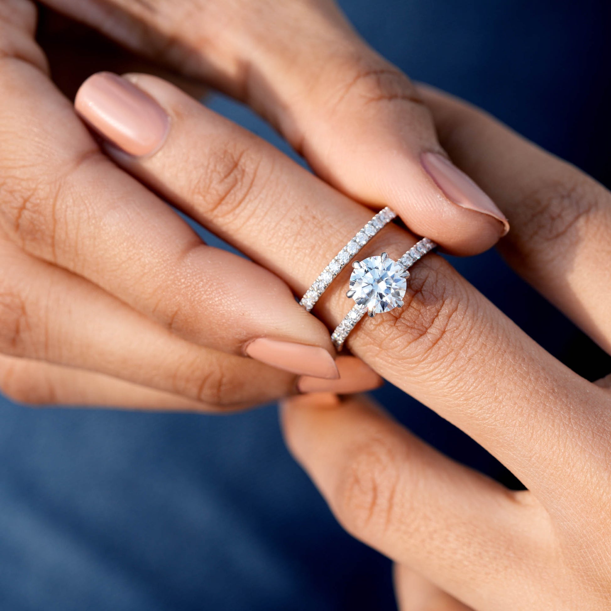 Round Cut Colorless Engagement Ring